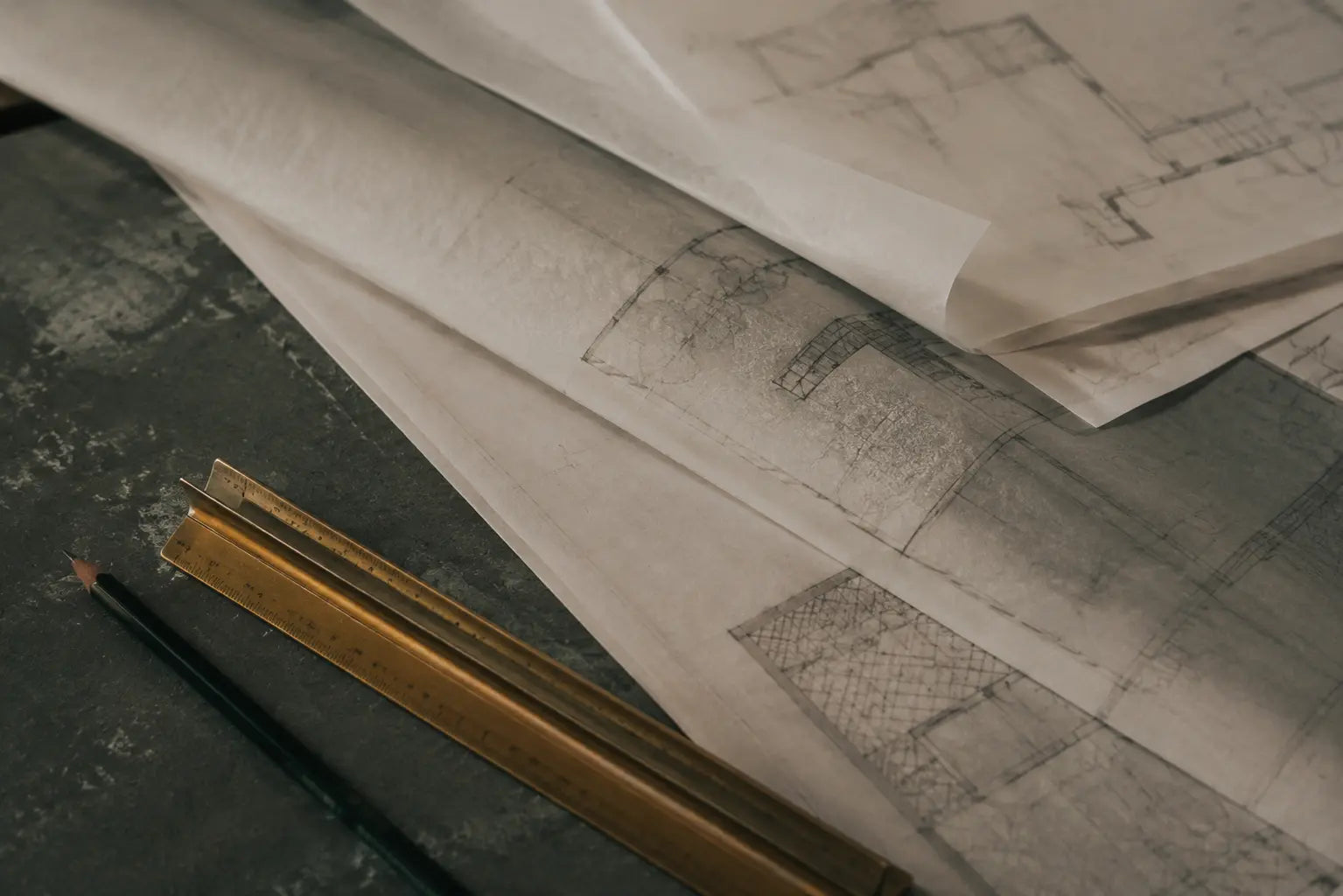 Architectural plans arranged on a drafting surface