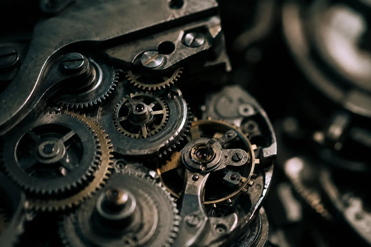 Interlocking mechanical gears representing connected workflows